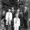 Groom and men with ring bearer