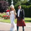 Milwaukie Rose Garden groom wore a kilt and black jacket with small sword