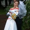 off the shoulder wedding gown with satin flower trim