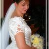 Bride with veil and bouquet in yellow and white