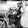 Bride and biker on Harley Davidson. Wedding at Bell Tower Chapel by The Radiant Touch wedding minister and photographer
