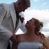 Groom and bride at rooftop ceremony in Portland Oregon by The Radiant Touch weddings