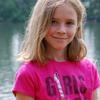 young girl in pink shirt